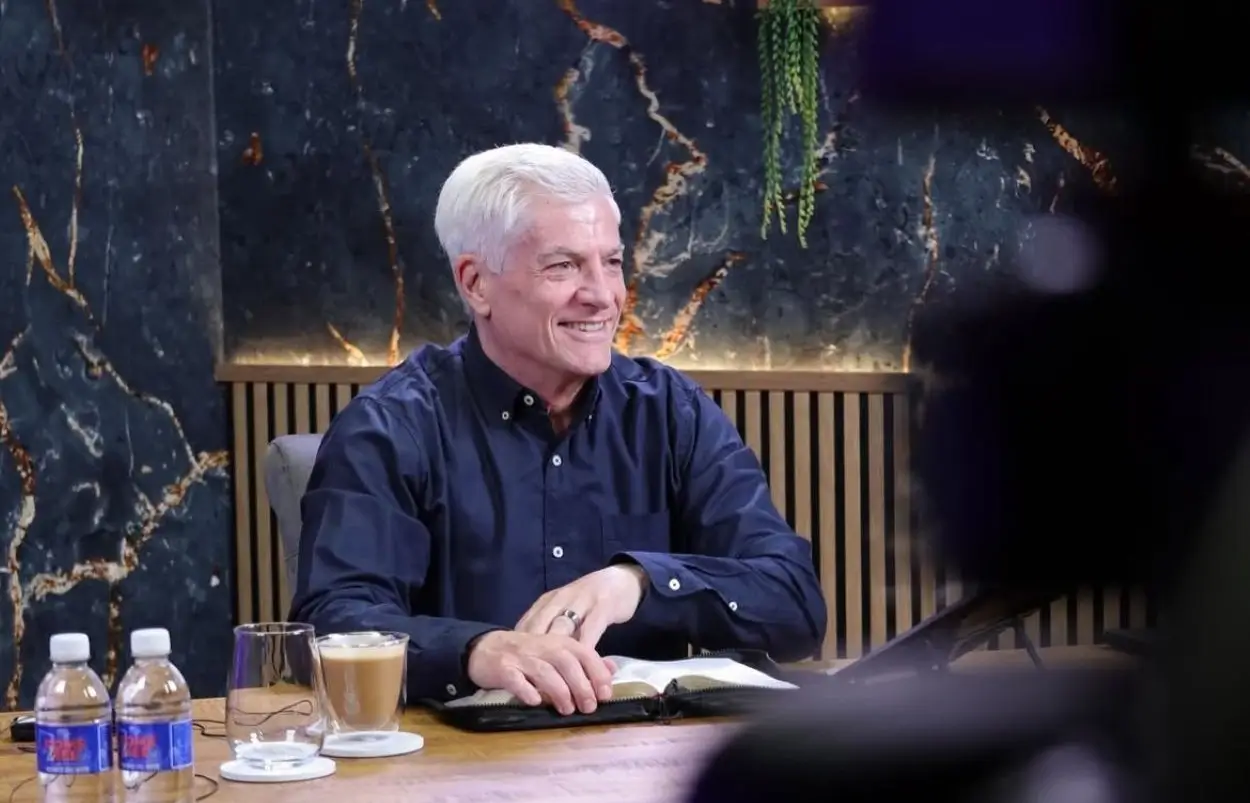 Photo of Allan talking