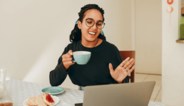 woman drinking coffee during eFamily discussion